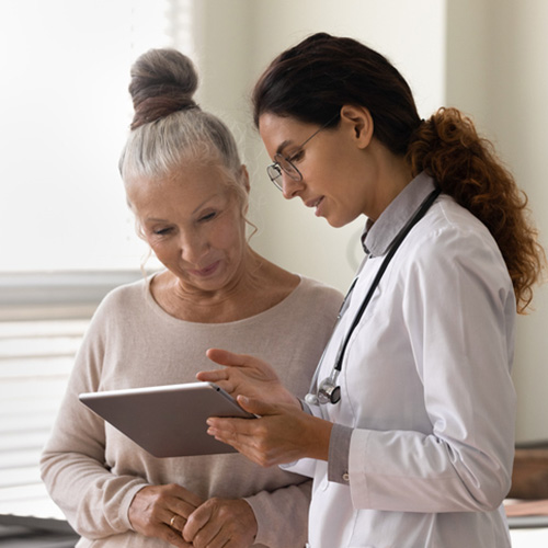 Doctor performing surgery with a team